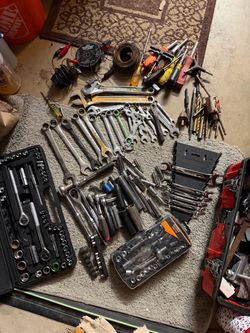 Tool box over filled with tools pending pick up