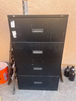 Free large black filing cabinet.