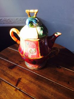 Teapot and cup