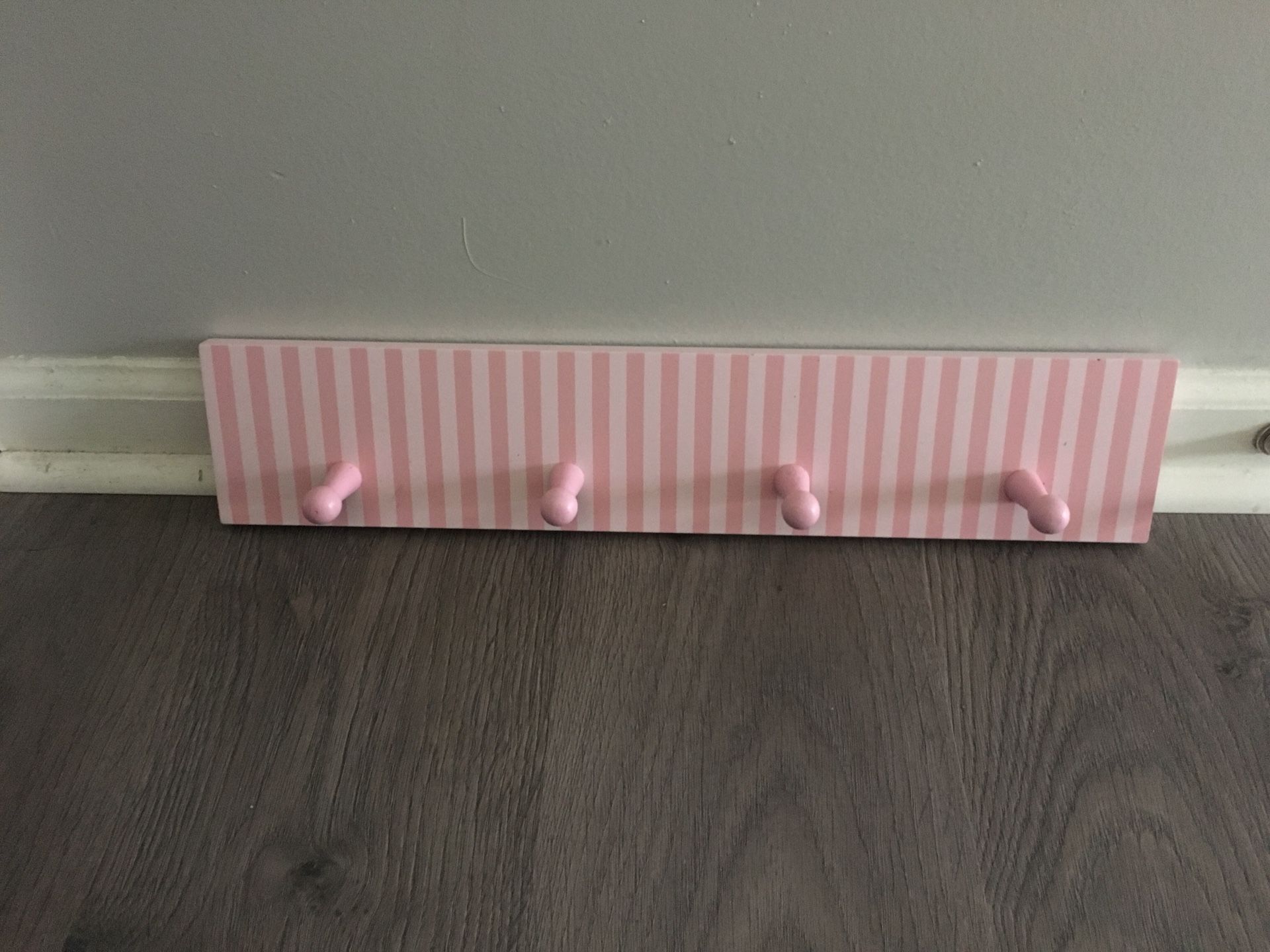 Girls room clothes hanging wall mount