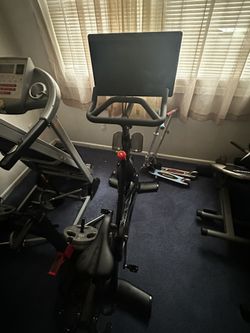 Peloton bike With 2 Pairs Of Cycling Shoes