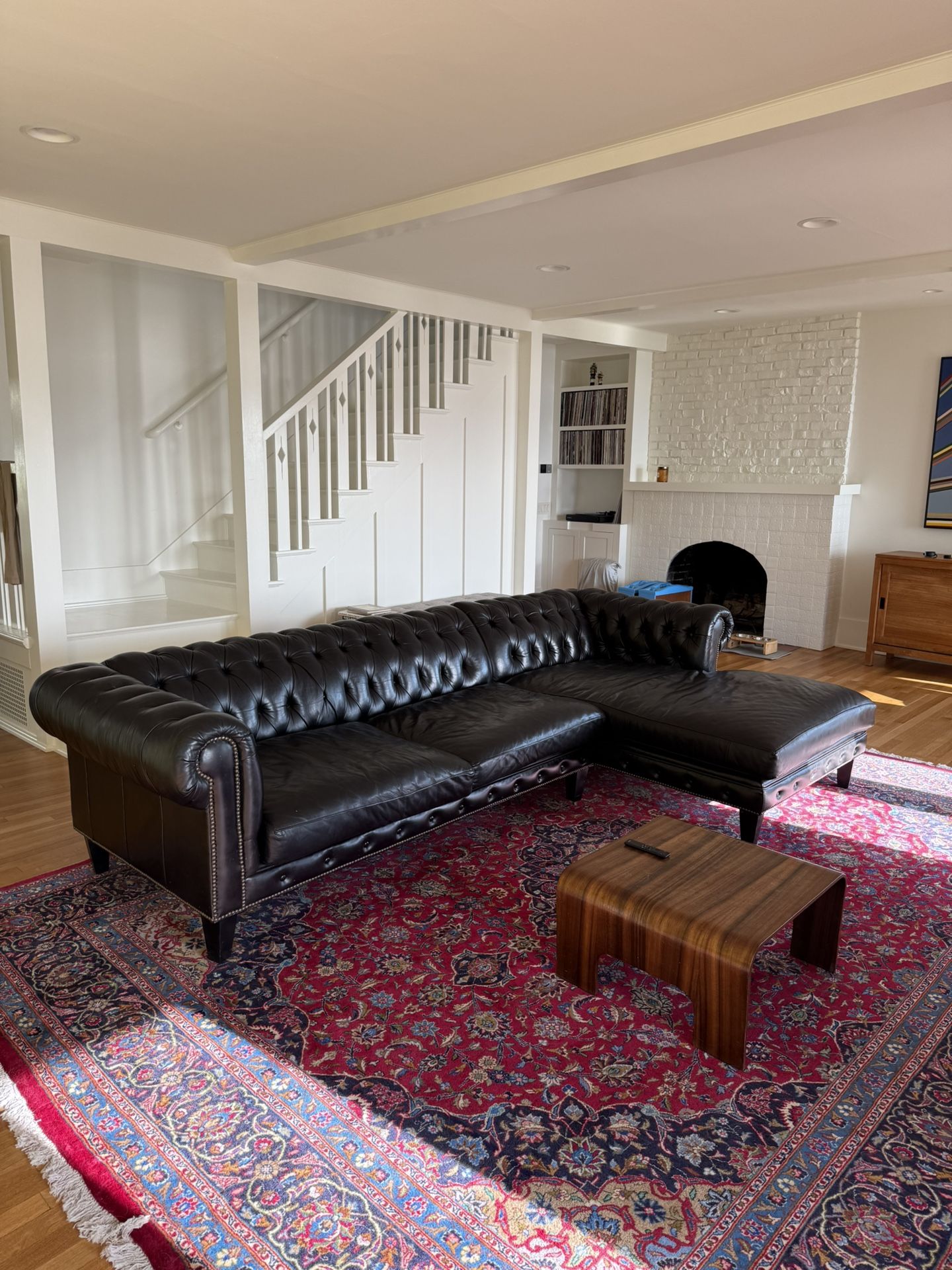 Black leather Chesterfield Sectional Couch
