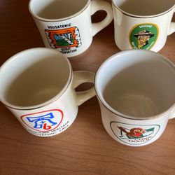 FOUR COUCIL SCOUT MUGS