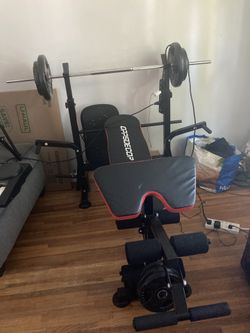 Workout Bench And Weights Ranging From 5-25lbs