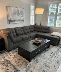 Gorgeous living spaces gray sectional couch !!