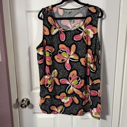 Women’s size 22 / 24 Sleeveless Top Tunic Length.  Made of 95% Polyester and 5% Elastane.  Floral Print .  Brand new never worn.  