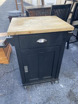 Wood end table with storage and wheels
