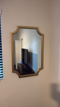 Gold framed mirrors