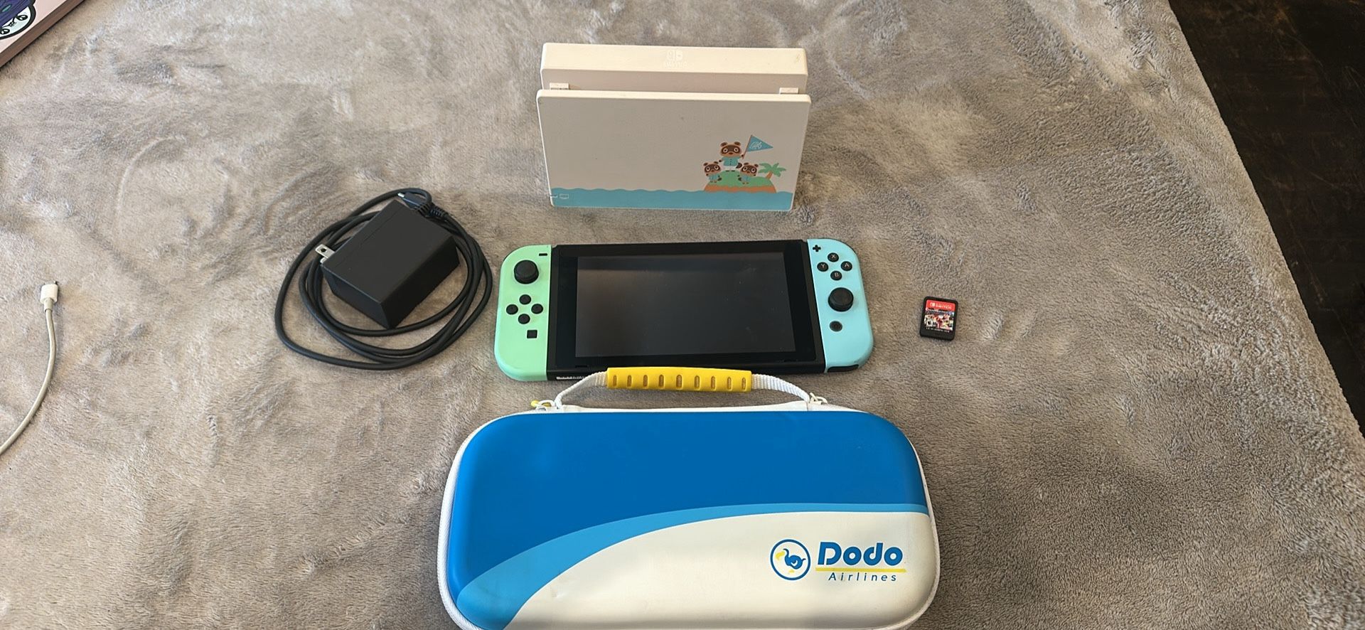 Nintendo Switch- Animal Crossing Edition (Matching Case, HDMI Cord, and Mario Kart Included)