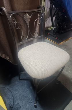 1 Wrought iron tall stool with cream seat