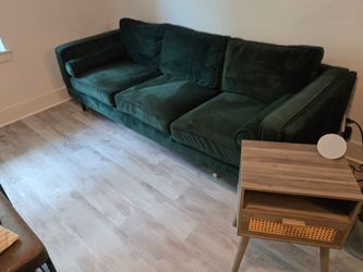 Designer sofa and rug with a side table