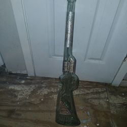 Old Tequila Bottle Shaped As A Shotgun
