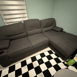 L Shaped Sectional Couch With Slide Out Bed Portion.