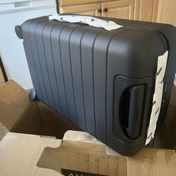 AWAY CARRY-ON SUITCASE, BLACK - BRAND NEW NEVER USED