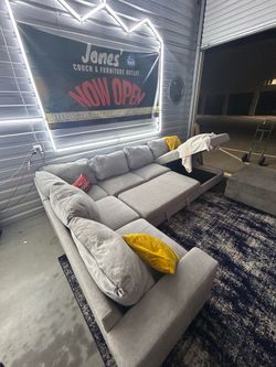 Pull out bed/ storage Sectional Sofa/ Couch (We Deliver)
