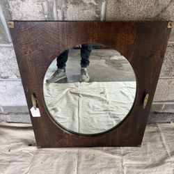 Mid-Century Modern walnut slab framed mirror.