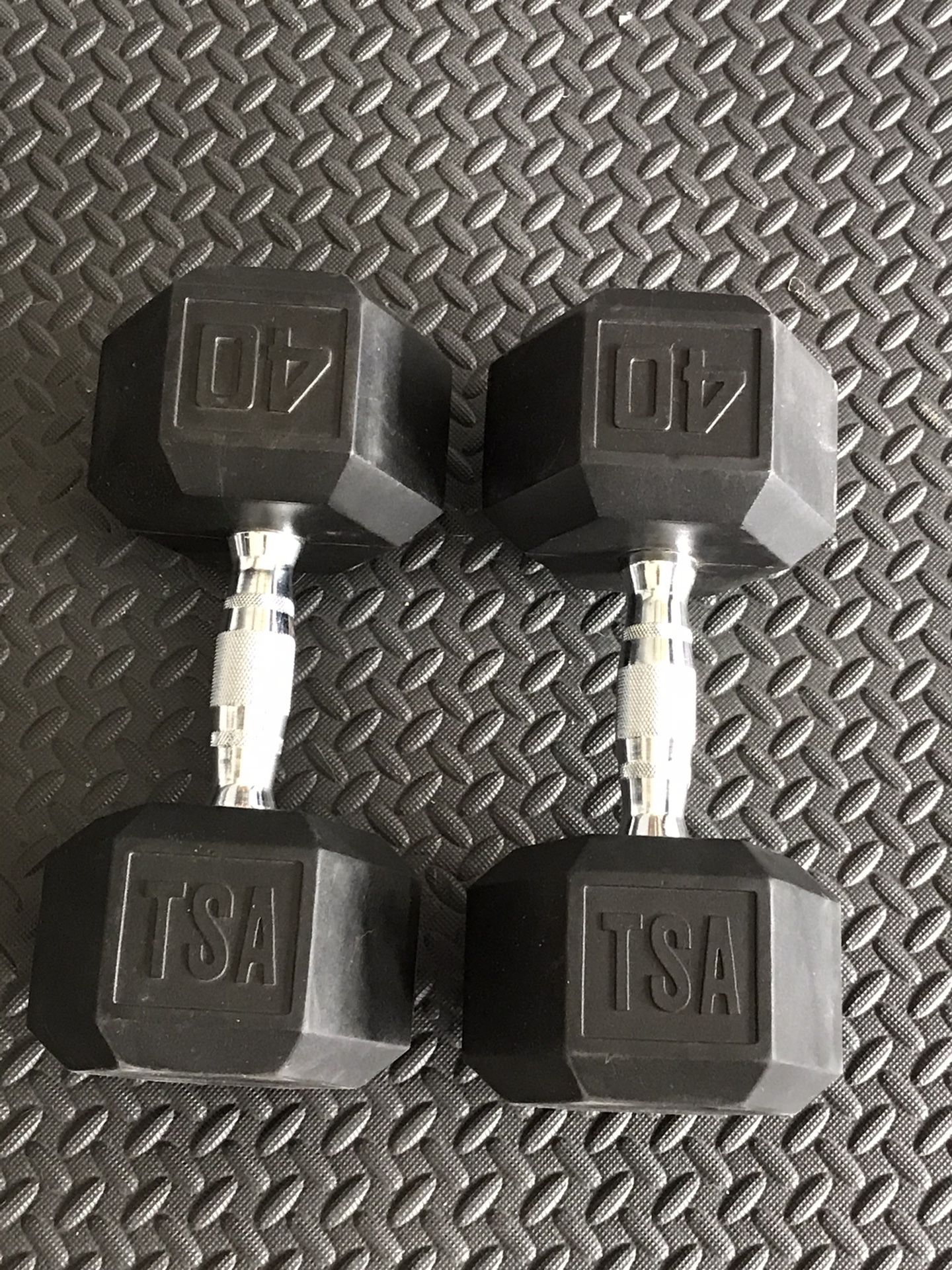 Dumbbells pair of 40 lbs price is firm