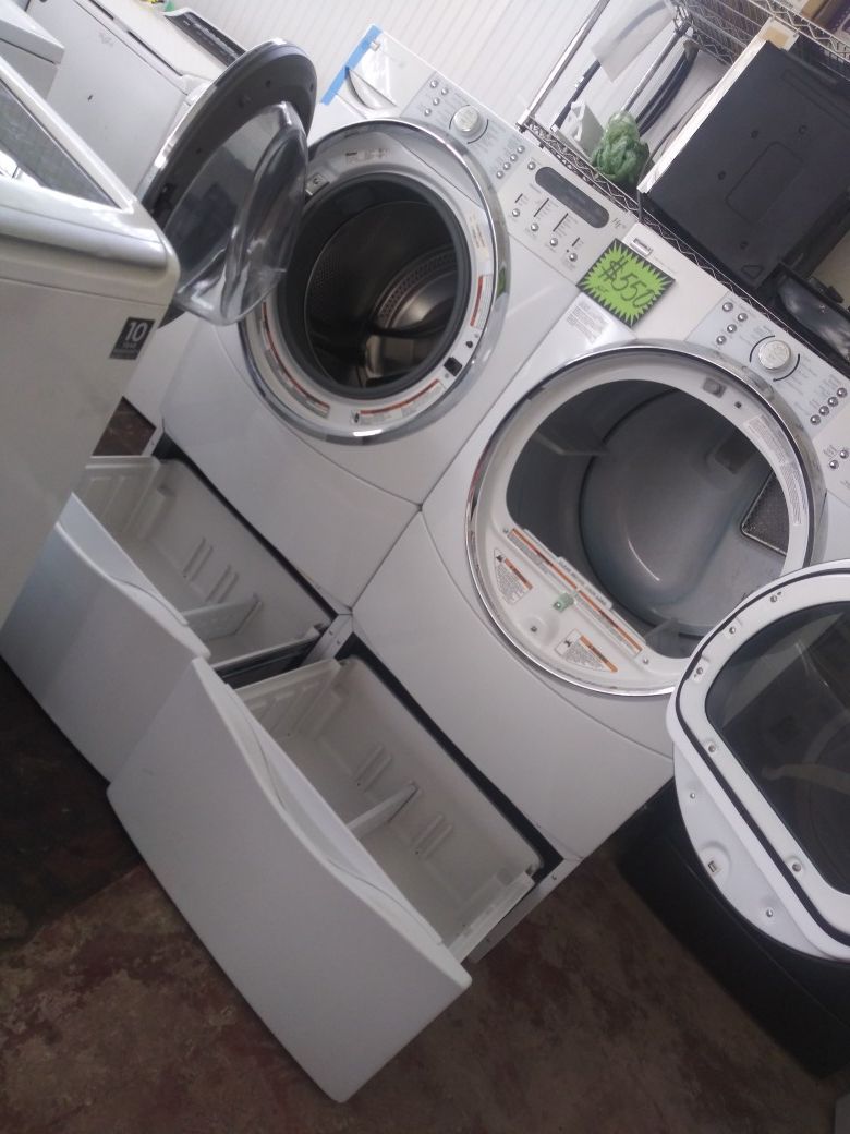 Kenmore front load washer and dryer set with pedestals in excellent conditions