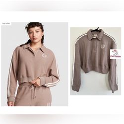 PINK REVERSE FLEECE CROPPED POLO SWEATSHIRT Medium  The Takeaway: Puts some prep in your step Sporty stripes and a cropped silhouette kick this classi