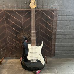 black and white electric guitar 