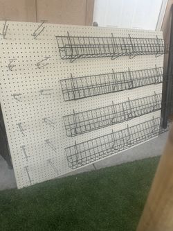 Display Pegboard With Wire Baskets And Hooks 