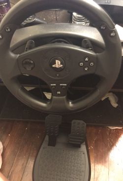 Thrust master steering wheel with pedals and ps3
