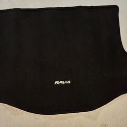 Genuine OEM Toyota carpet cargo trunk mat for a 2013-2018 Toyota Rav4