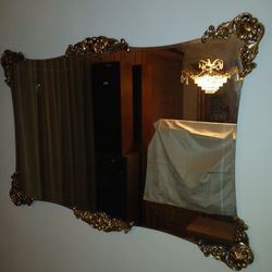 Antique Wall Mirror With Gold Decerations At Four Corners