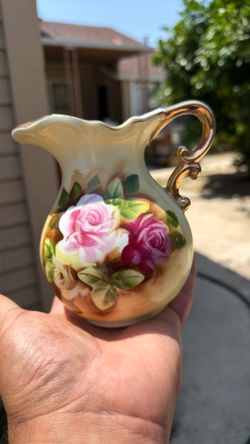 Vintage  Enesco floral pitcher with gold trim on Handel and pour