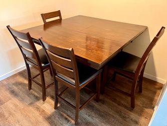 Counter height pub dining table with leaf and storage, 4 chairs