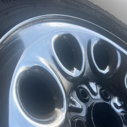 GMC Chrome wheels & Great tires.