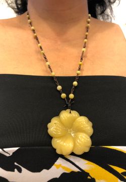 Carved jade flower pendant necklace