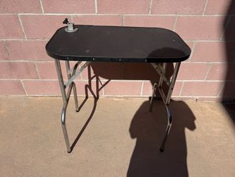 Pet grooming table