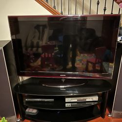 Tv, Speaker And Tv Stand