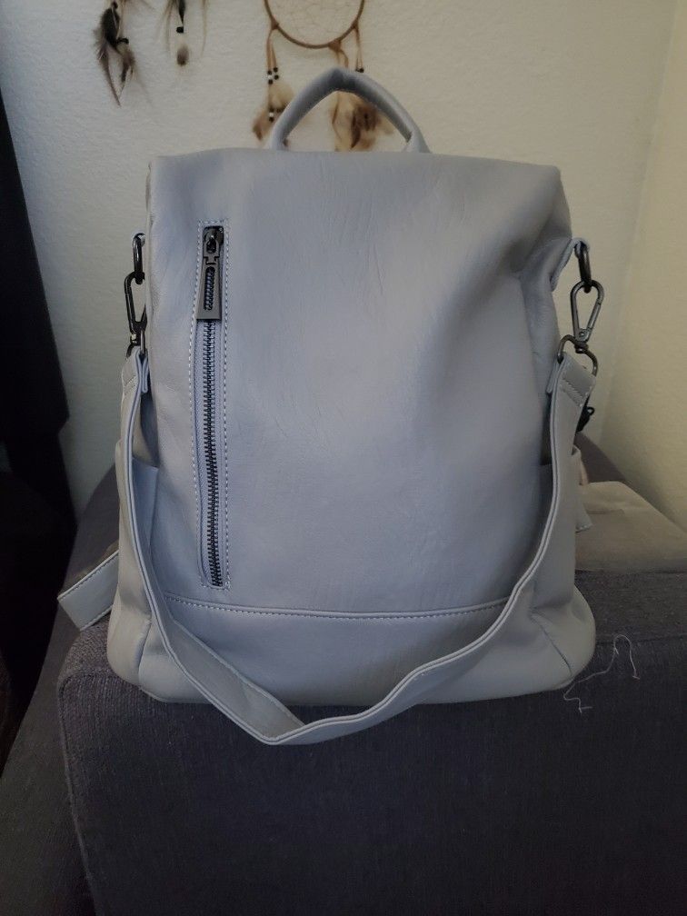 Light Gray Leather Backpack.