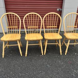 Four wooden chairs