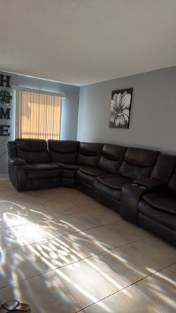 Dark brown leather sofas