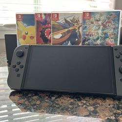 Nintendo Switch  Scarlet And Violet Edition ( OLED Model ) 