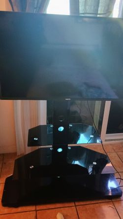50" Sanyo tv and stand