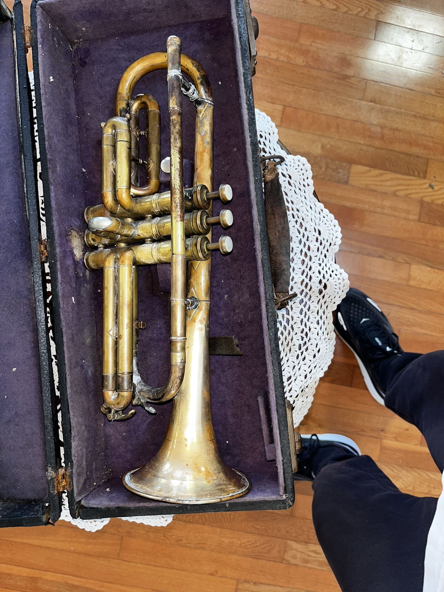 Conn vintage antique C Trumpet 16” long w/ black leather case. This Beautiful antique brass instrument has large bore (.462) valves are in great sha
