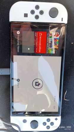 Nintendo Switch OLED $120 w/3 games