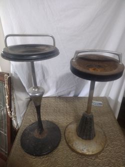 A pair of vintage floor-standing ashtrays