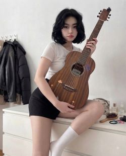 Small Acoustic Guitar with Stickers