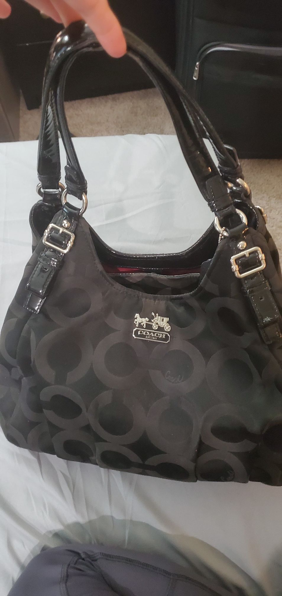 Black COACH purse. With tags and logo. Maroon. Red. Shoulder bag. Pink.  Silver accents. for Sale in Dallas, TX - OfferUp