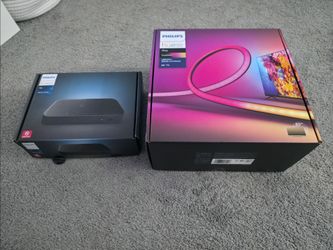 Philips Hue Play HDMI Sync Box 8K and light strip 75inch