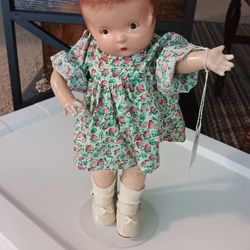 Vintage doll with original dress