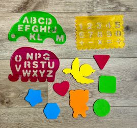 Kids learning stencils and foam shapes