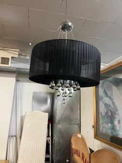 three light chandelier with black shade