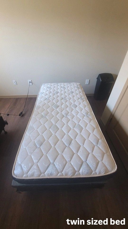 A TWIN SIZED BED