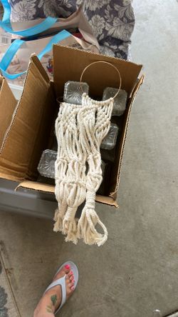 Three medium macramé hanging plant holders